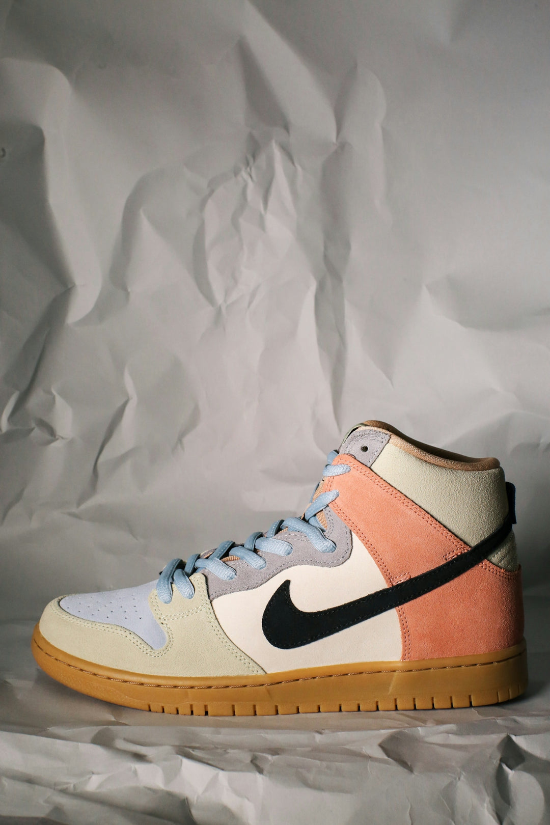 white and brown nike sneaker