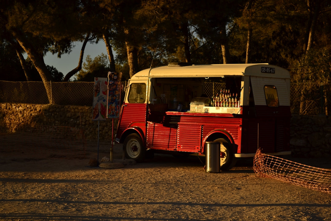 red and white bus on road during daytime