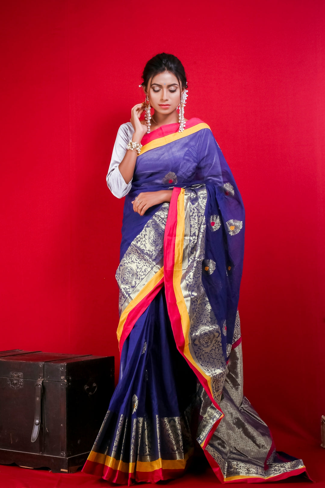 woman in blue and red sari dress
