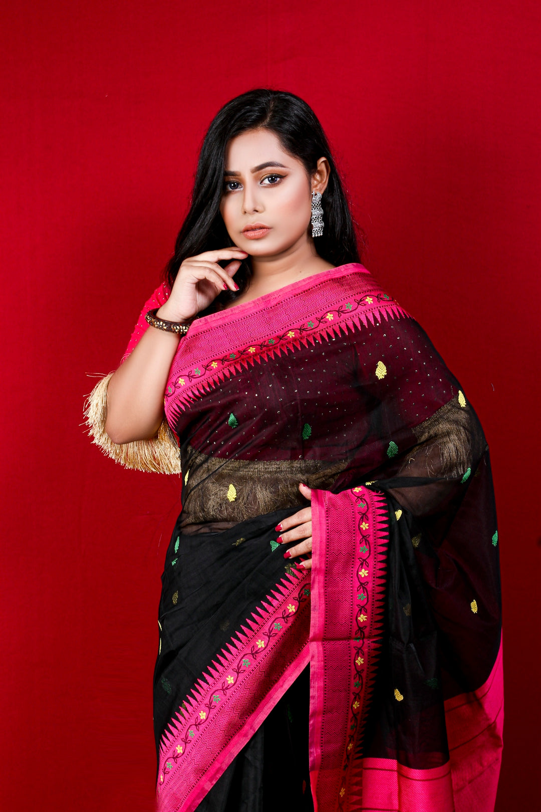 woman in red and brown sari
