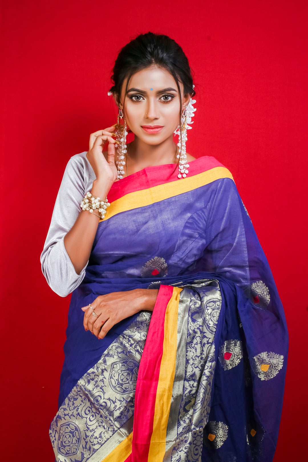 woman in blue and yellow sari dress