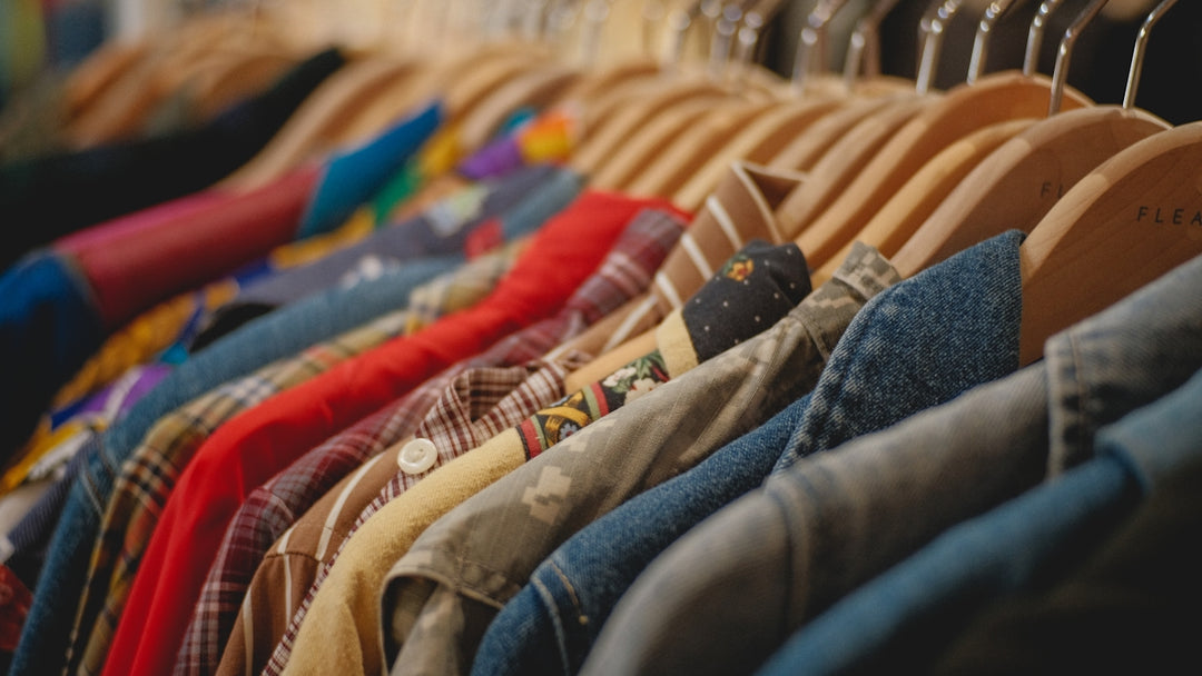 blue denim jeans on brown textile