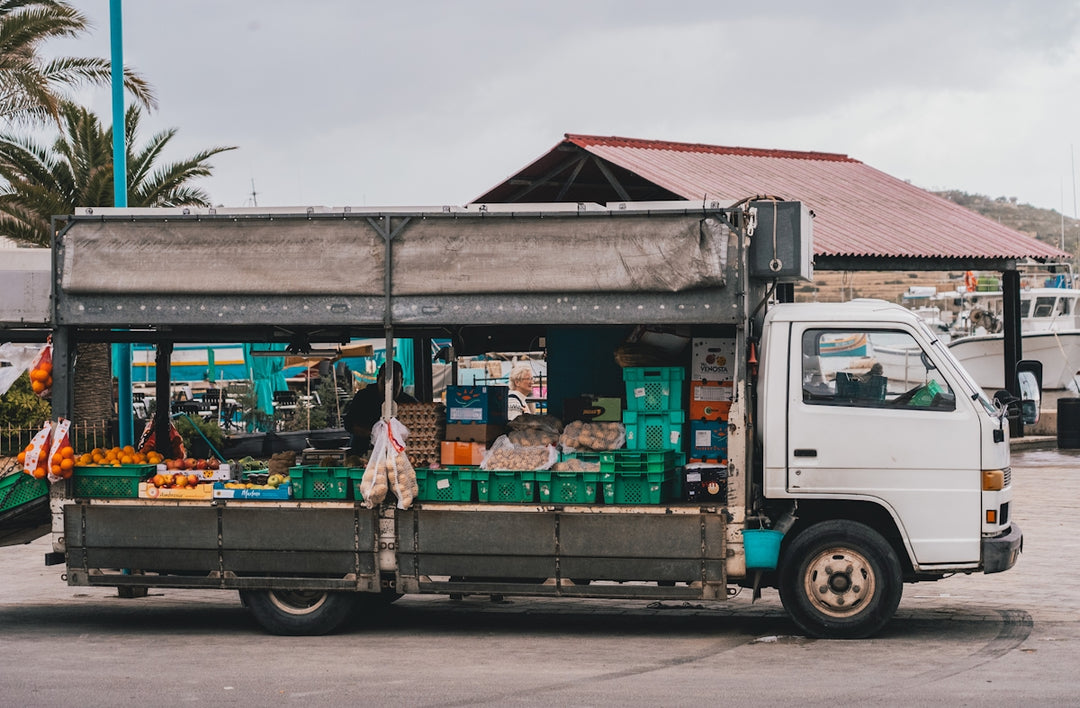 a truck is parked in front of a store
