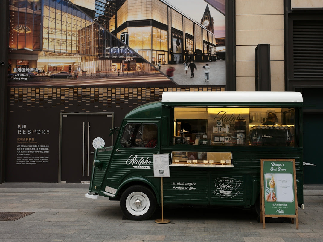 a food truck parked on the side of a street