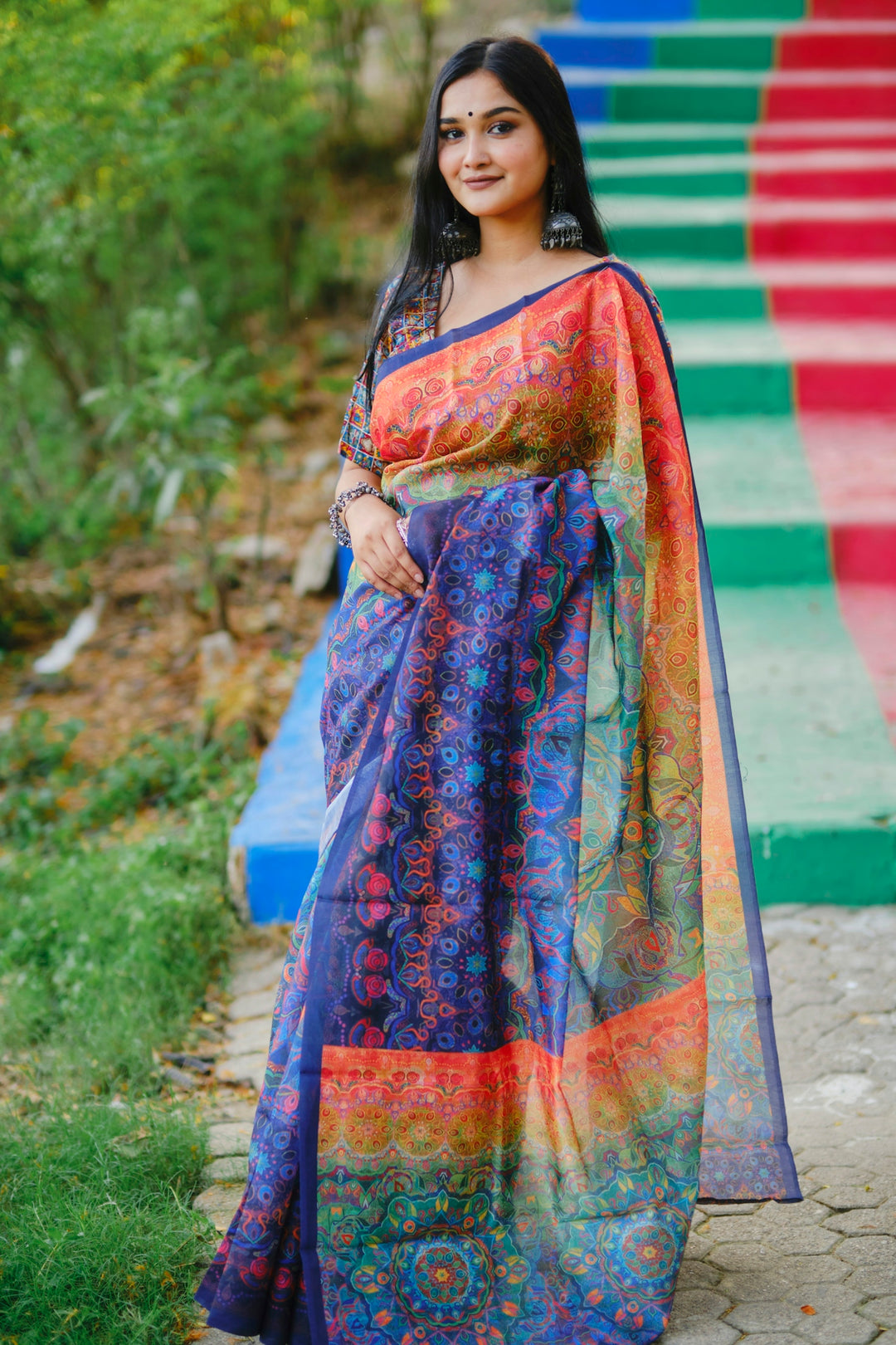 a beautiful woman in a colorful sari
