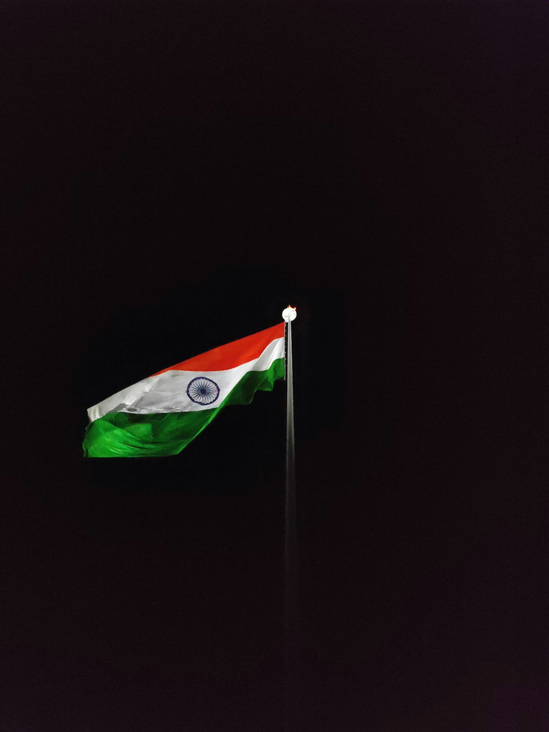 The flag of india is flying high in the sky