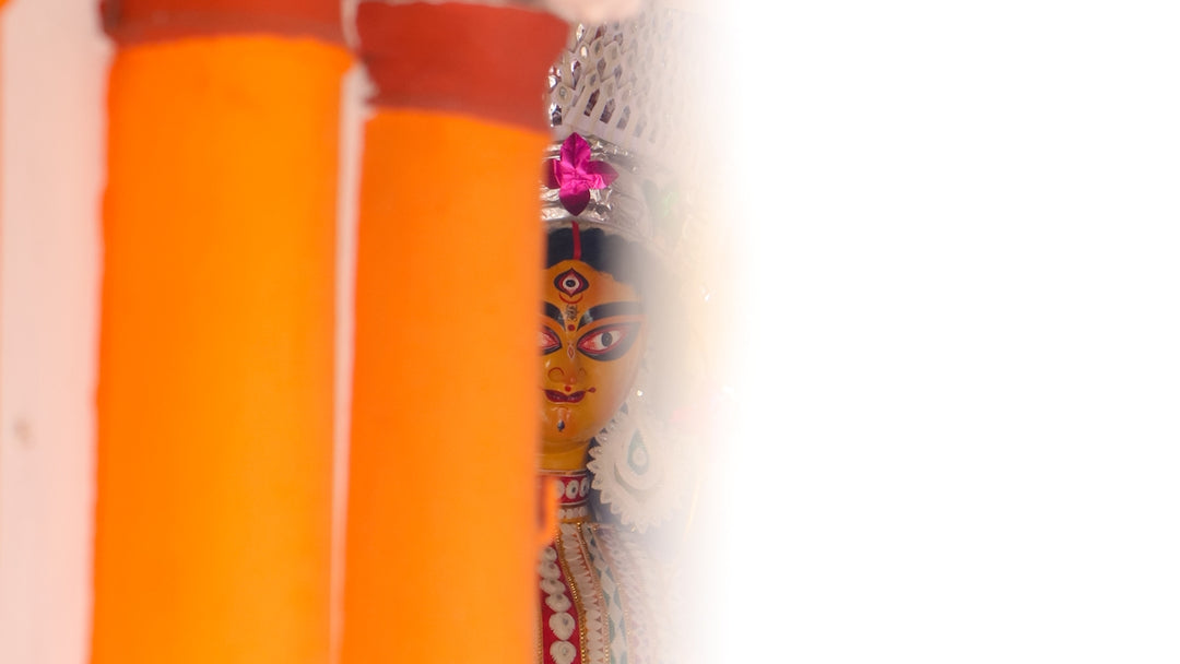 A group of orange candles sitting next to each other