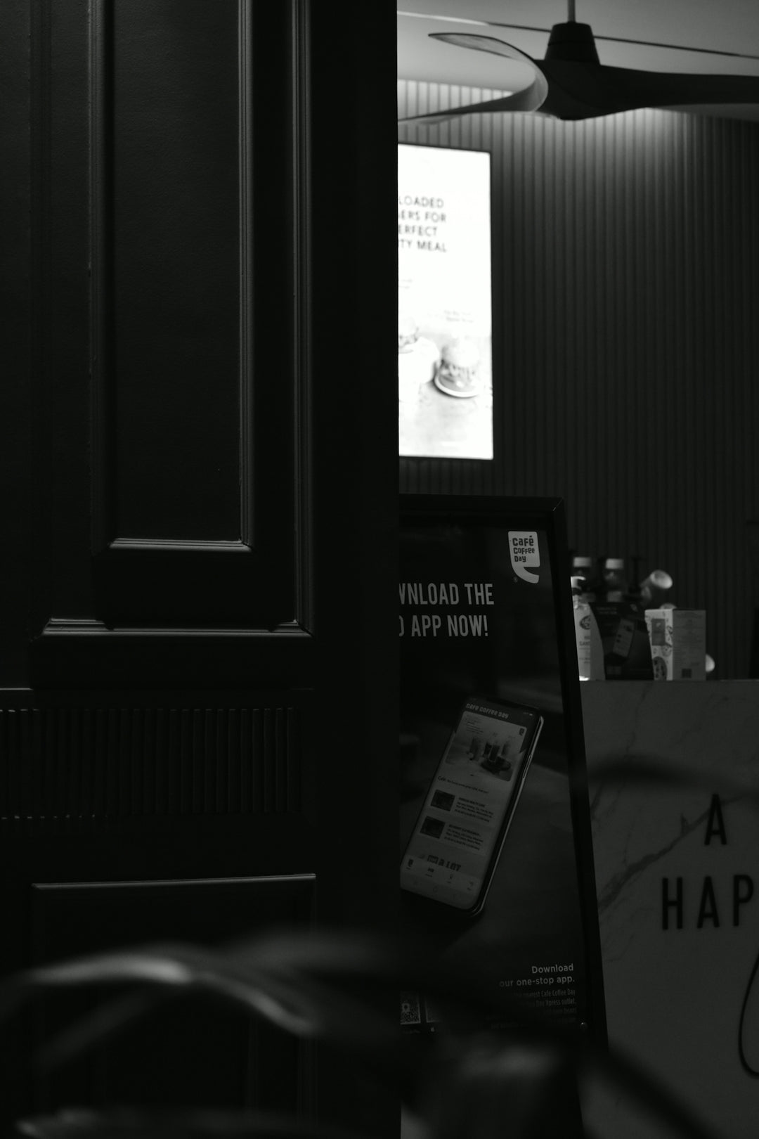 A black and white photo of a restaurant