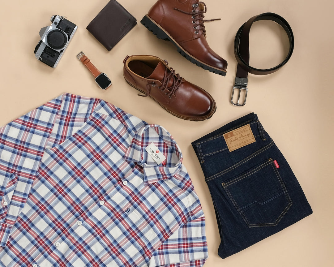 A pair of brown shoes, a pair of jeans, a pair of brown shoes