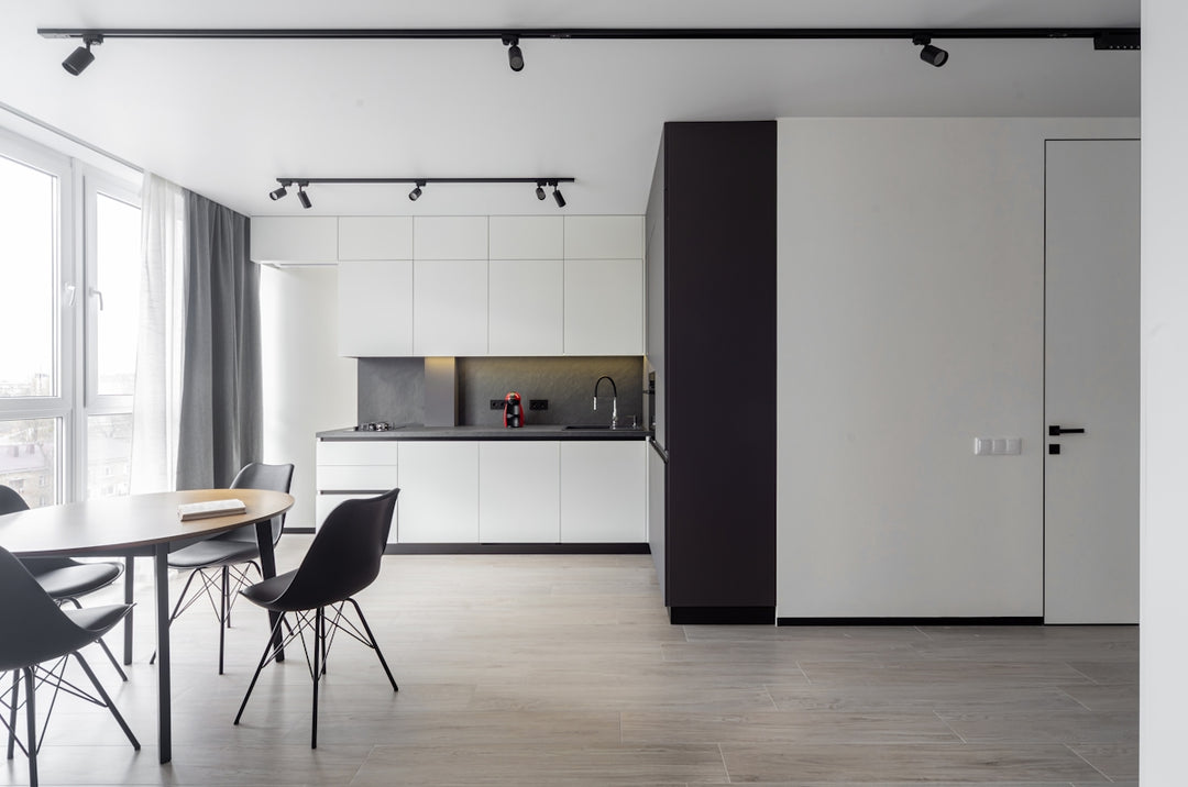 Modern kitchen and dining area with minimalist design.