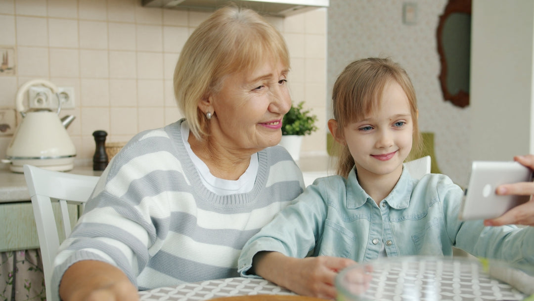 Grandmother and granddaughter taking a selfie together