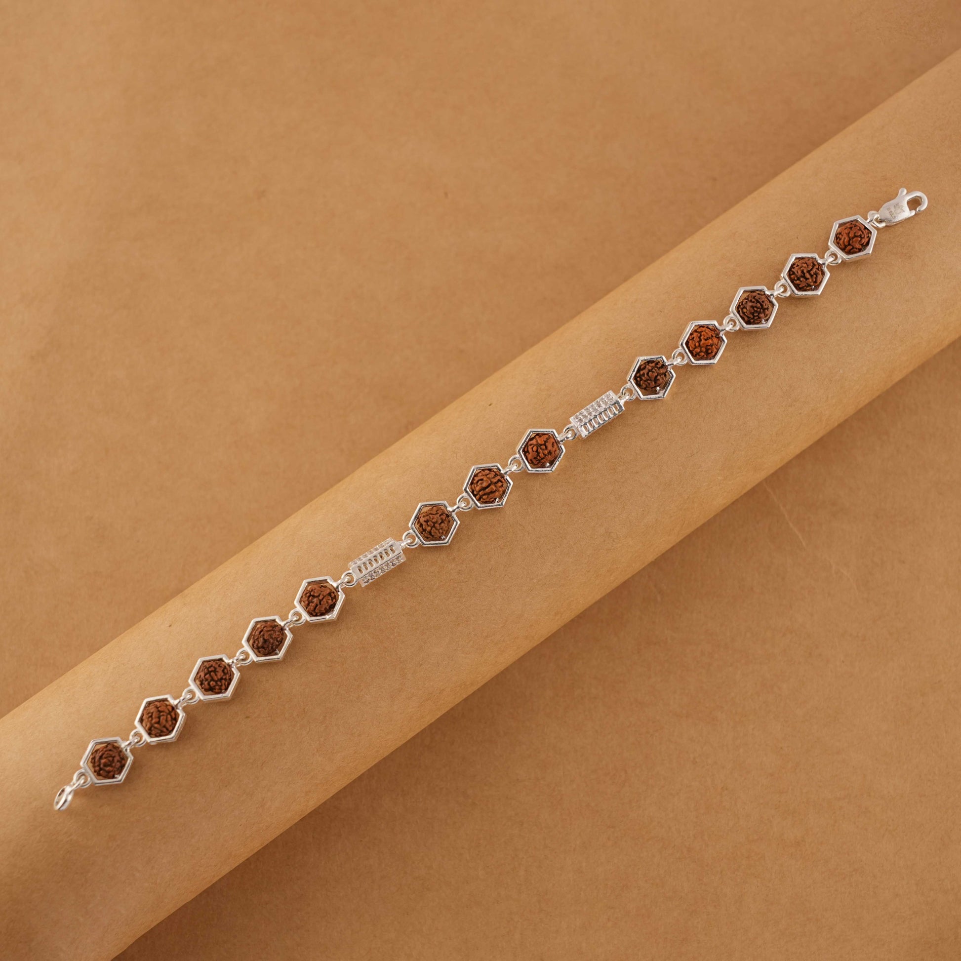 Silver Rakhi with Hexagon Rudraksha Beads