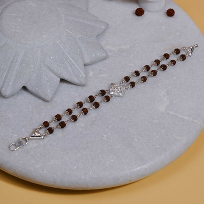 Silver Rakhi with Rudraksha, Om, and Rhombus Double Line Design