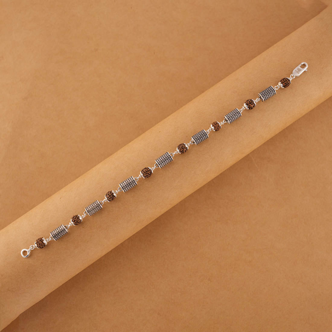 Rudraksha and Hollow Cylindrical Silver Beads Bracelet