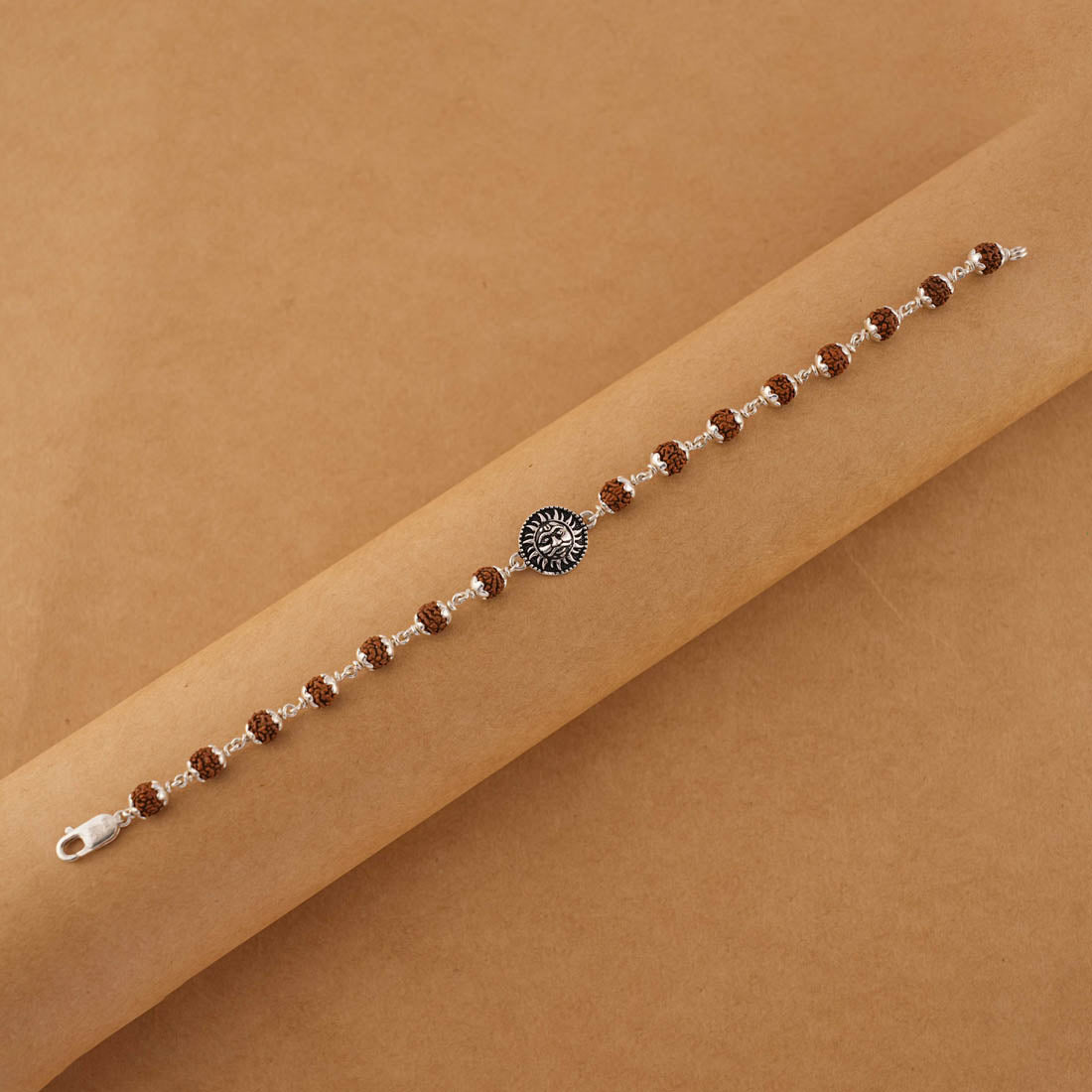 Silver Rakhi with Suryadev and Rudraksha