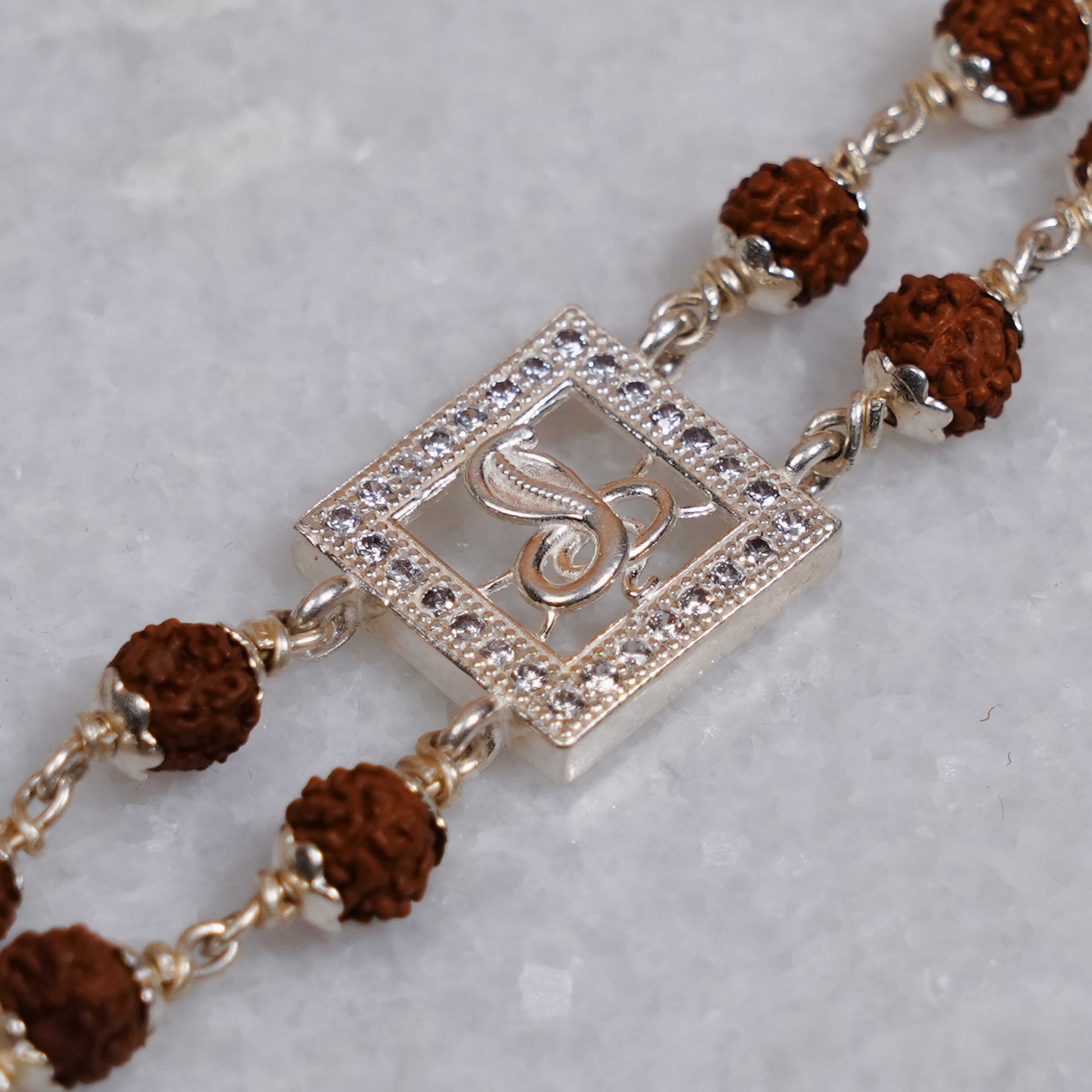 Rudraksha Silver bracelet with central Naag double line for men