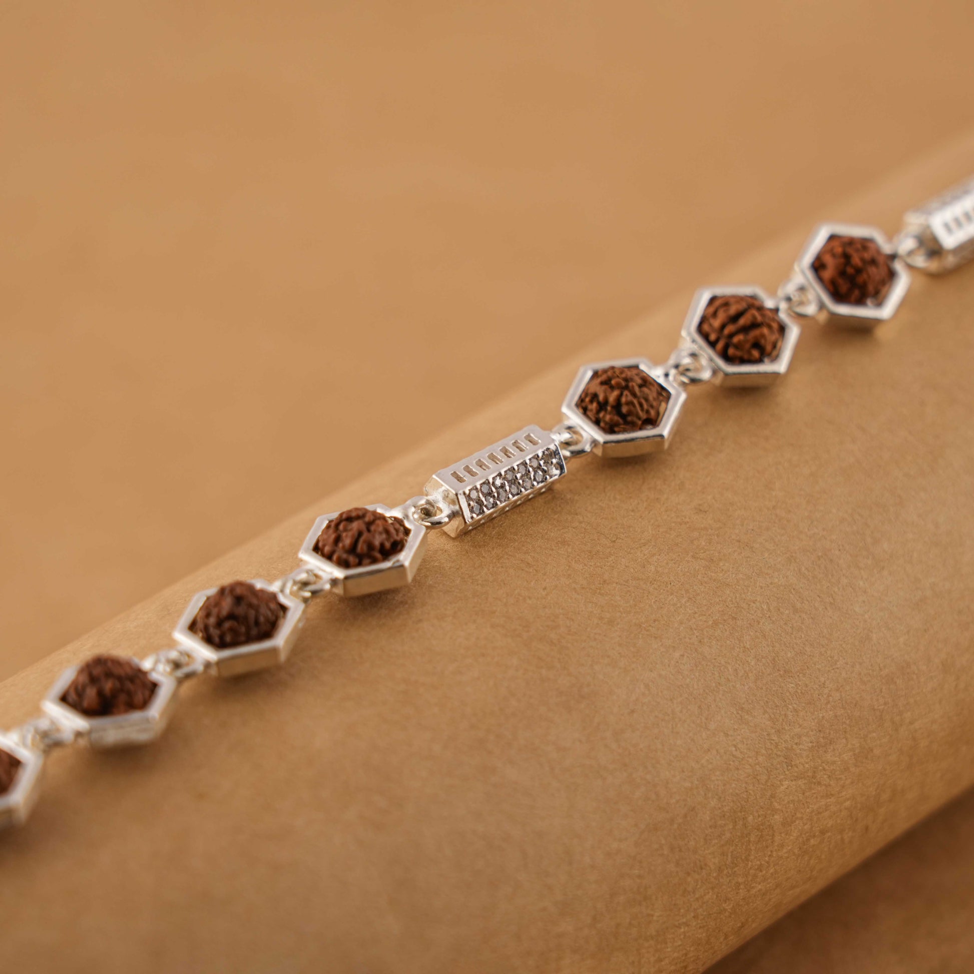 Silver Rakhi with Hexagon Rudraksha Beads
