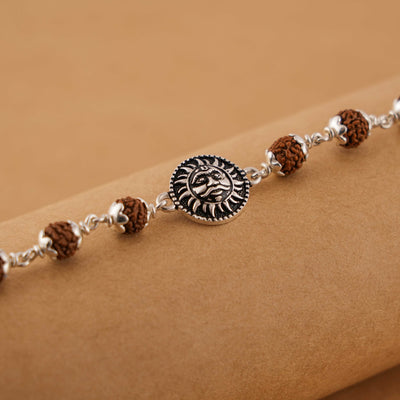 Silver Rakhi with Suryadev and Rudraksha