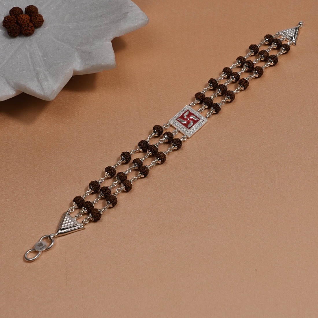 Rudraksha Silver Swastik in Red Triple Line Bracelet