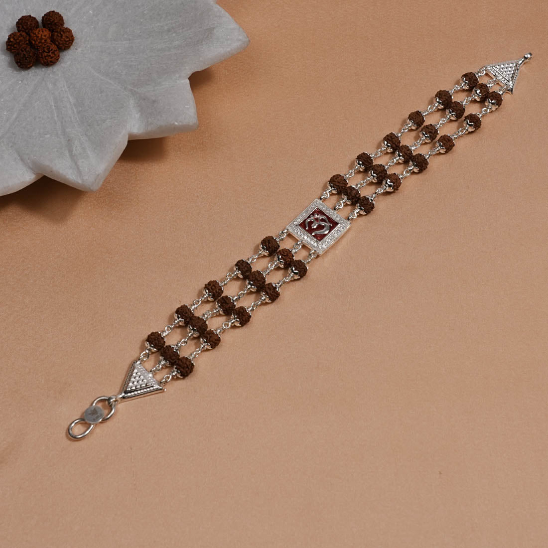 Rudraksha Silver Om in Red Triple Line Bracelet