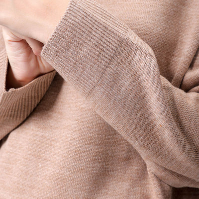 Women's Beige Loose Fit High Neck Solid Sweater