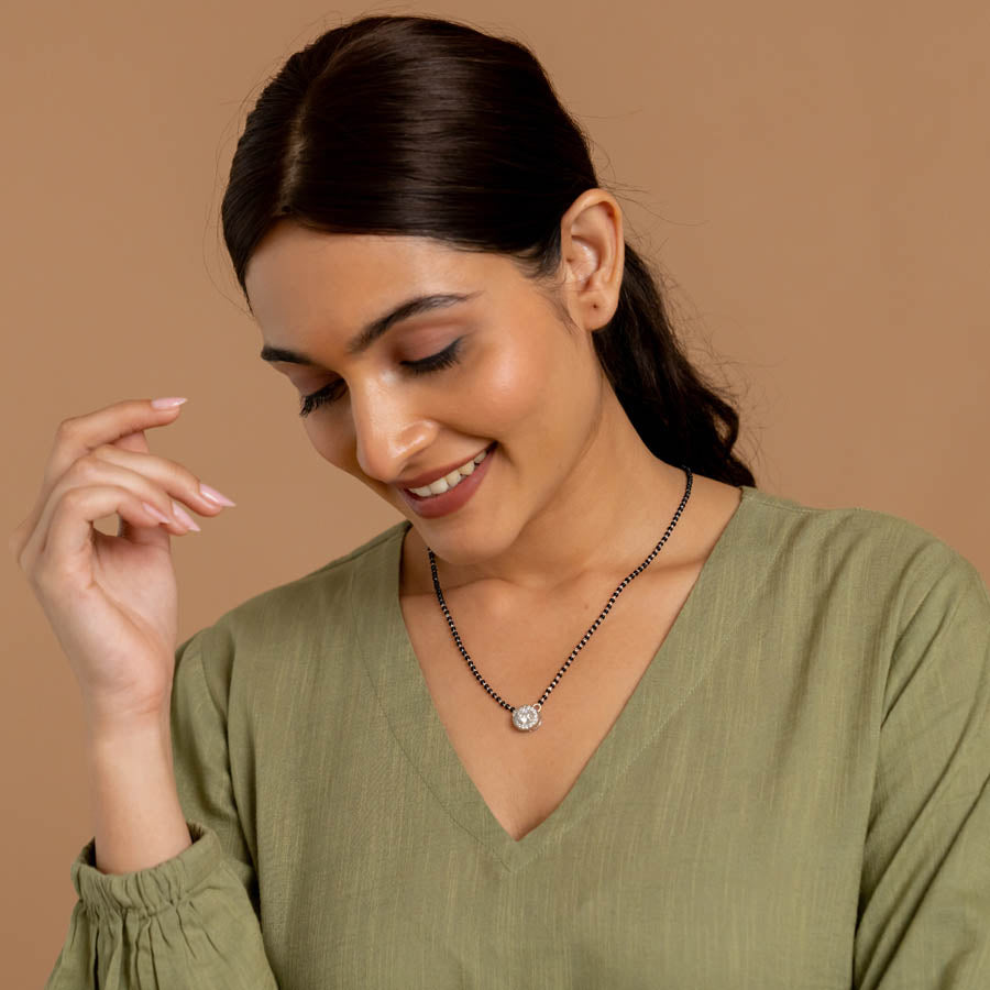 1.SOLITAIRE ROUND SHAPE MANGALSUTRA IN SILVER 92.5