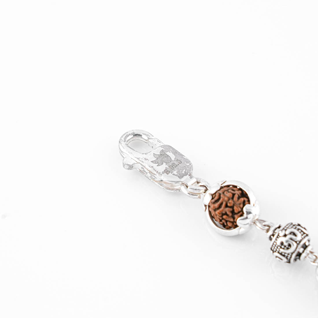 Rudraksha Silver Om Beads Capping Bracelet