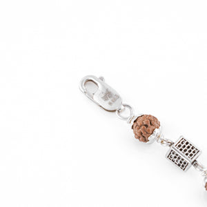 Silver Rakhi with Square Cylinder Rudraksha Beads
