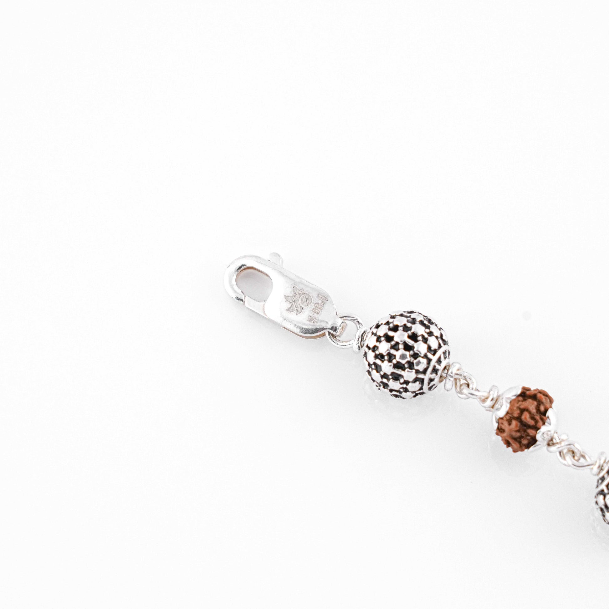 Rudraksha Silver Hollow Round Beads Bracelet.