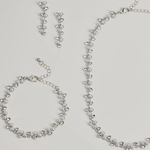 Glimmering Rhinestone And Pearl Necklace, Bracelet, And Earrings Set