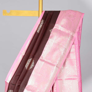 Brown floral motifs gift saree with contrast paisley border & intricate zari design pallu