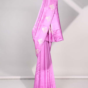 Pink floral buttas raw mango silk saree with self floral border & zari design pallu