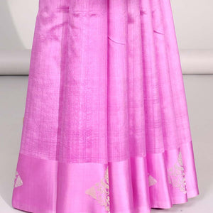 Pink floral buttas raw mango silk saree with self floral border & zari design pallu
