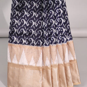 Blue intricate design ikkat saree with triangle motifs & geometric, floral motifs pallu