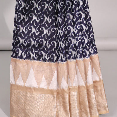 Blue intricate design ikkat saree with triangle motifs & geometric, floral motifs pallu