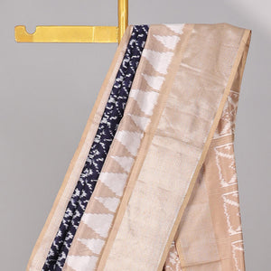 Blue intricate design ikkat saree with triangle motifs & geometric, floral motifs pallu
