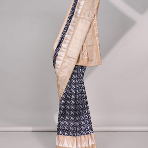 Blue intricate design ikkat saree with triangle motifs & geometric, floral motifs pallu