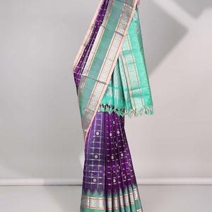 Purple floral motifs enclosed with checked kuppadam cotton saree with contrast zari border & pallu of argyle pattern