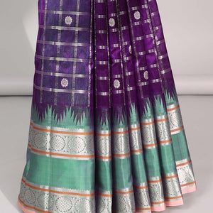Purple floral motifs enclosed with checked kuppadam cotton saree with contrast zari border & pallu of argyle pattern