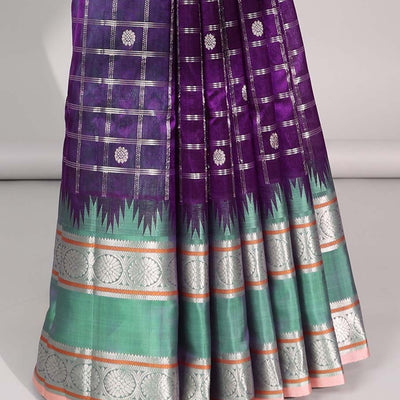 Purple floral motifs enclosed with checked kuppadam cotton saree with contrast zari border & pallu of argyle pattern