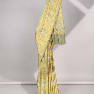 Cream floral vine design with plain border & pallu of argyle design