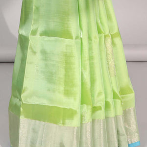 Green floral buttas uppada saree with contrast zari border & floral buttas enclosed with argyle design pallu