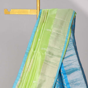 Green floral buttas uppada saree with contrast zari border & floral buttas enclosed with argyle design pallu