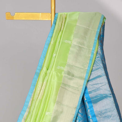 Green floral buttas uppada saree with contrast zari border & floral buttas enclosed with argyle design pallu