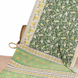 Green floral vine machine-printed kalamkari cotton saree, contrast floral creeper border & intricate pallu
