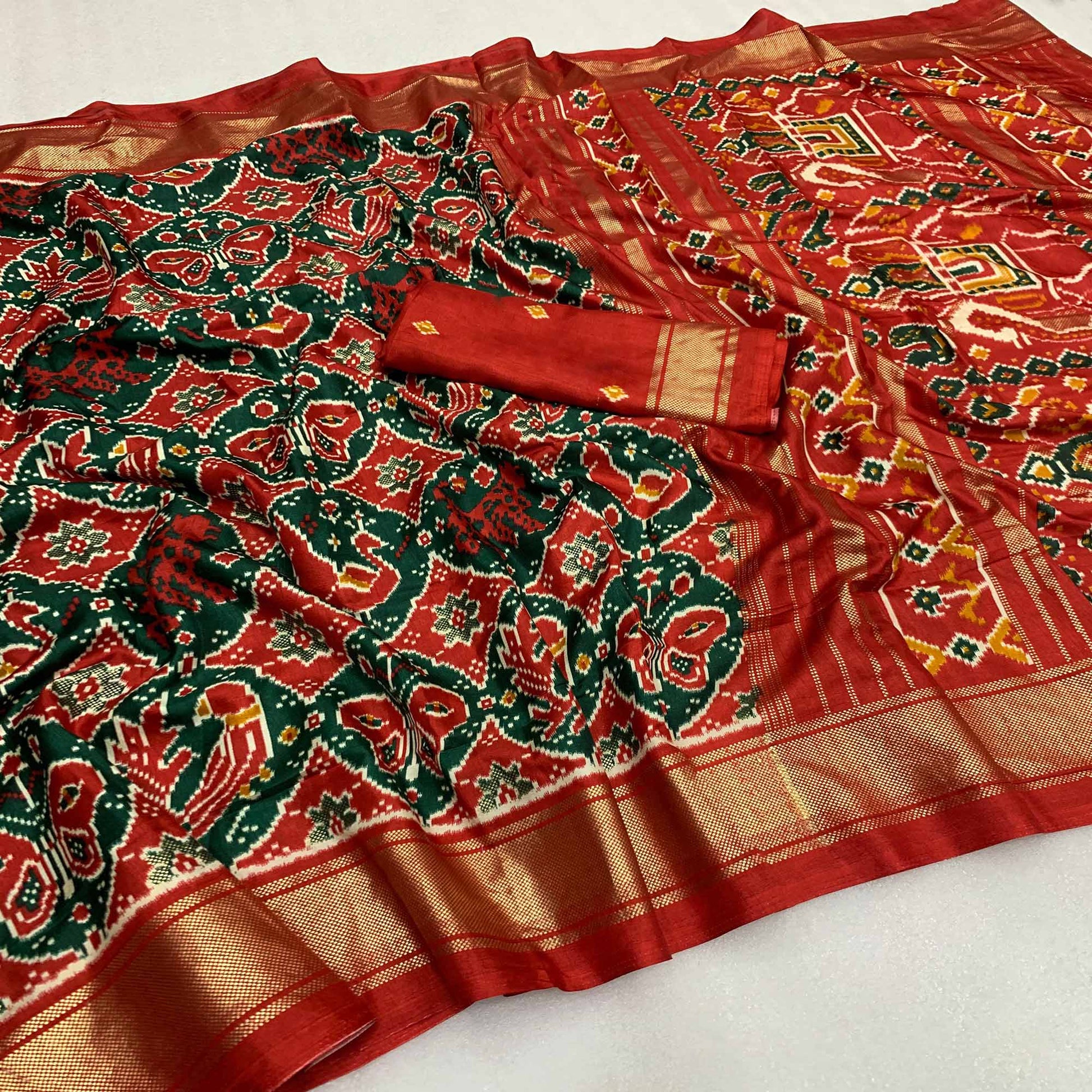 green-red-patola-printed-viscose-saree-with-zari-border