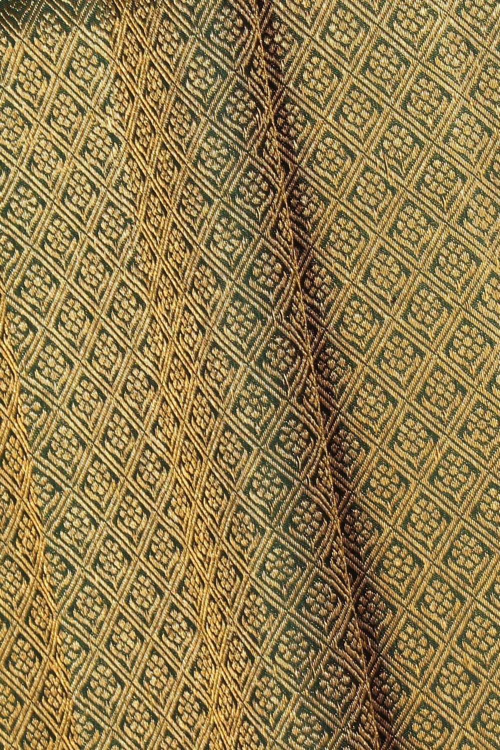 Kanchipattu Bottle Green Pavada Unstitched Set