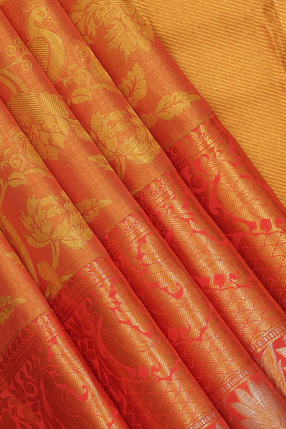 Kanchipattu An Ethereal Gold-Orange Saree