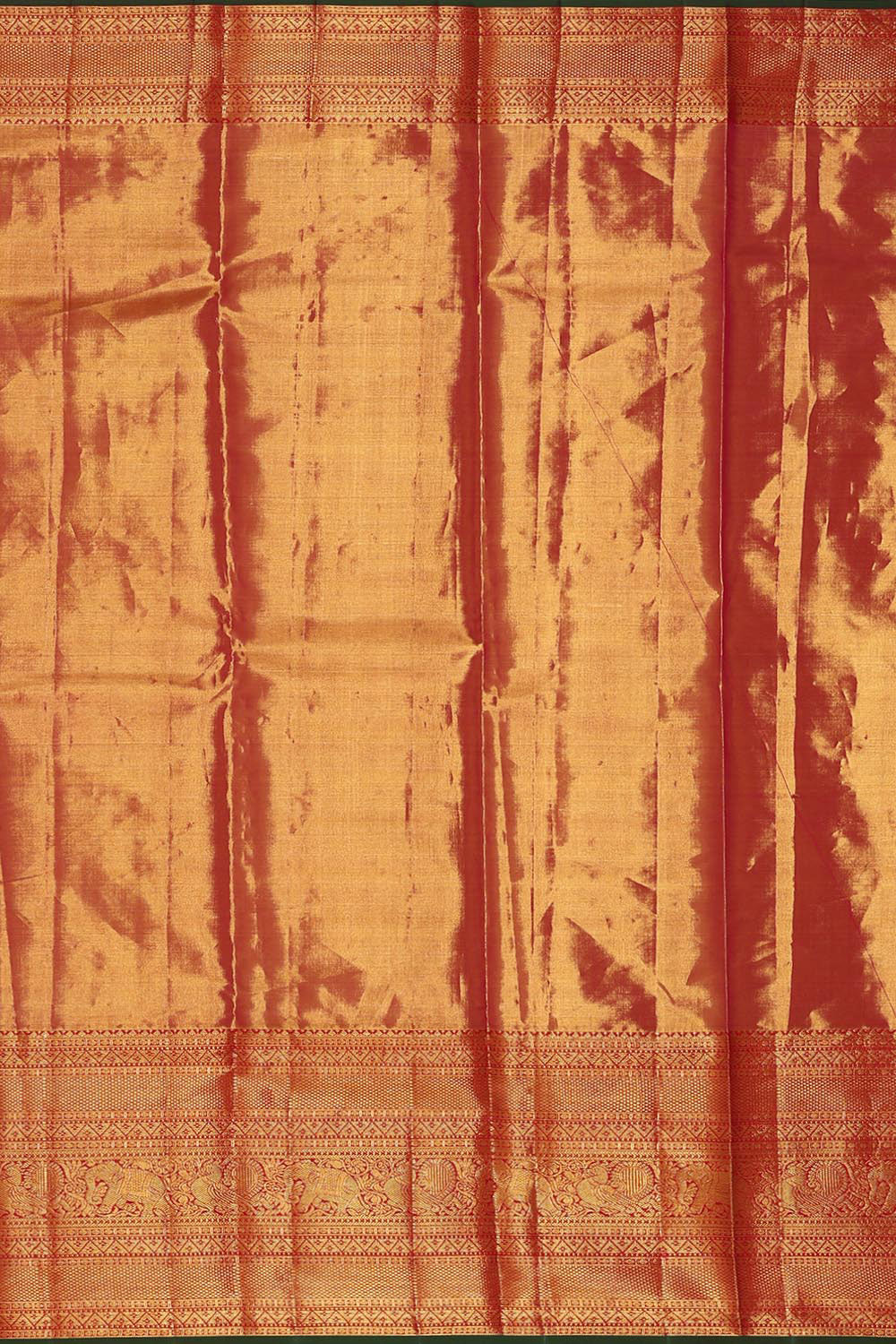 Kanchipattu An Ethereal Gold-Green Saree