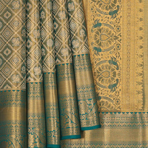Kanchipattu An Ethereal Gold/Teal Blue Saree